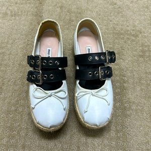 Miu Miu Ballerina Lace up White Espadrilles with black laces.  Approx 1.75